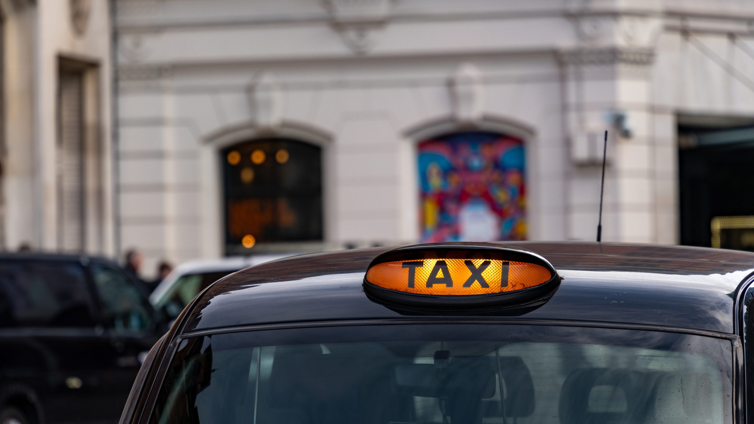 Taxi with it's sign on ready for hire